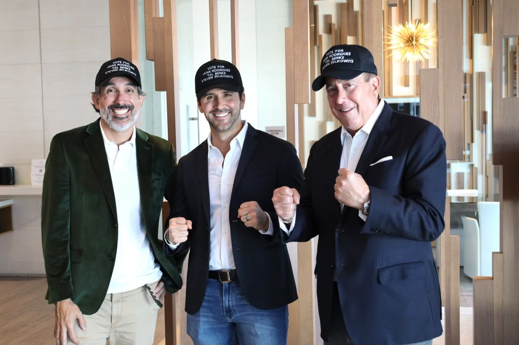 Team photo with vote hats